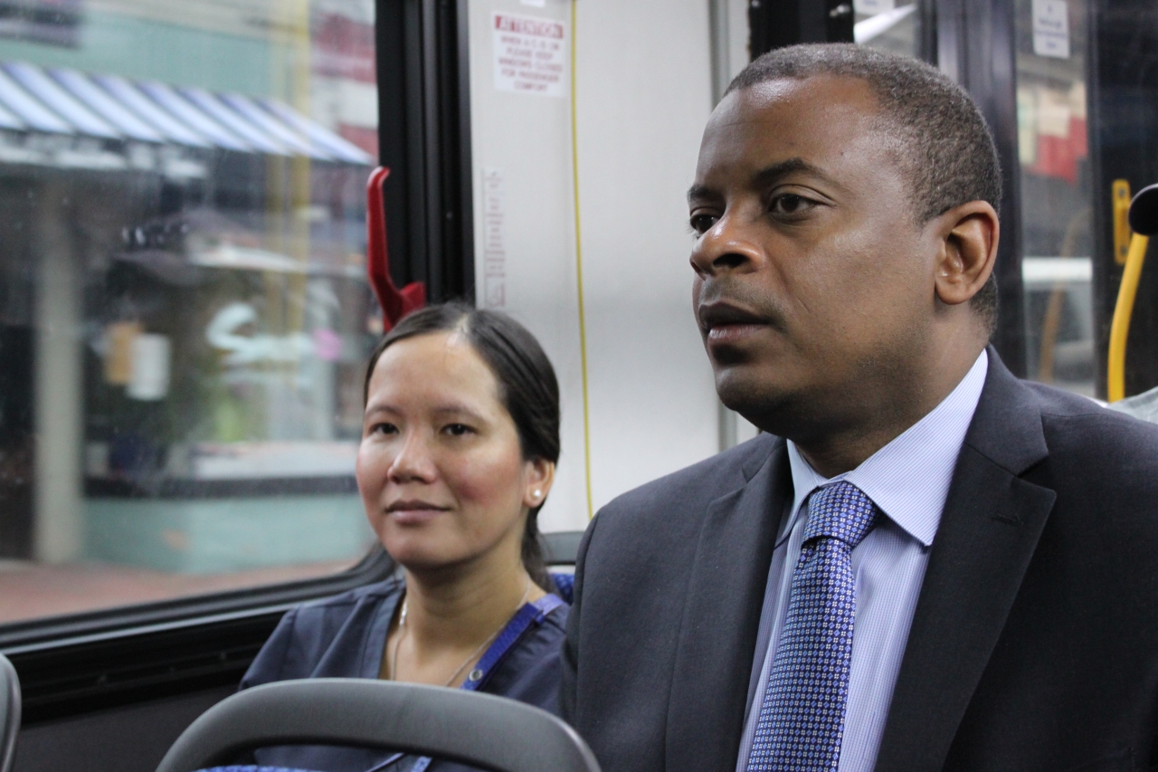 Photo of Secretary Foxx and Lan riding the 63 Metrobus