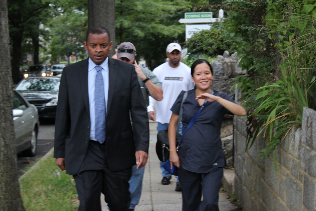 Photo of Secretary Foxx walking the last mile with Lan