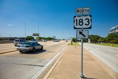 photo showing highway with car and I 83 sign
