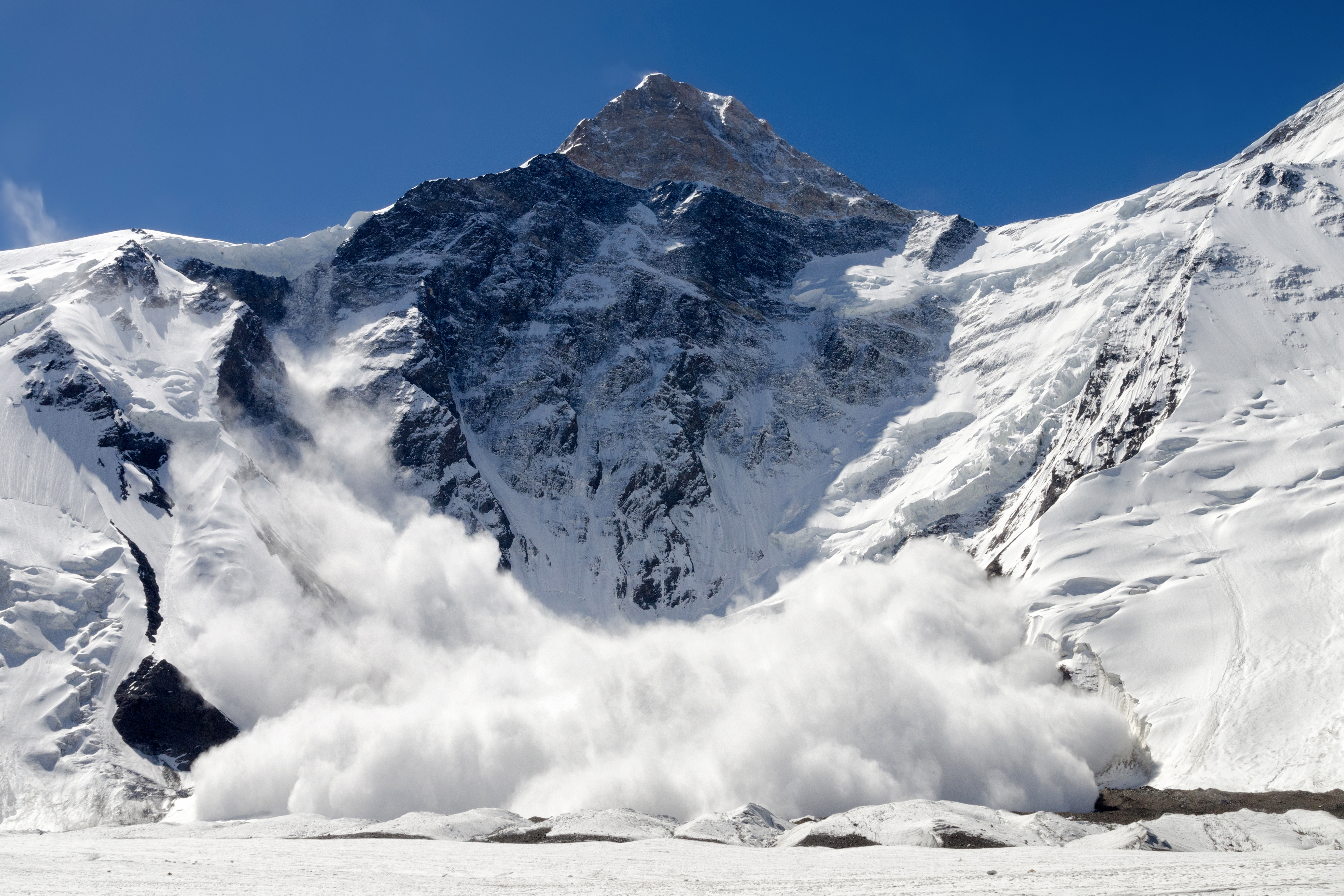 Avalanche Near Mountaineering Cache on Kahiltna Glacier at Denali Base Camp, Alaska (Adobe Stock).