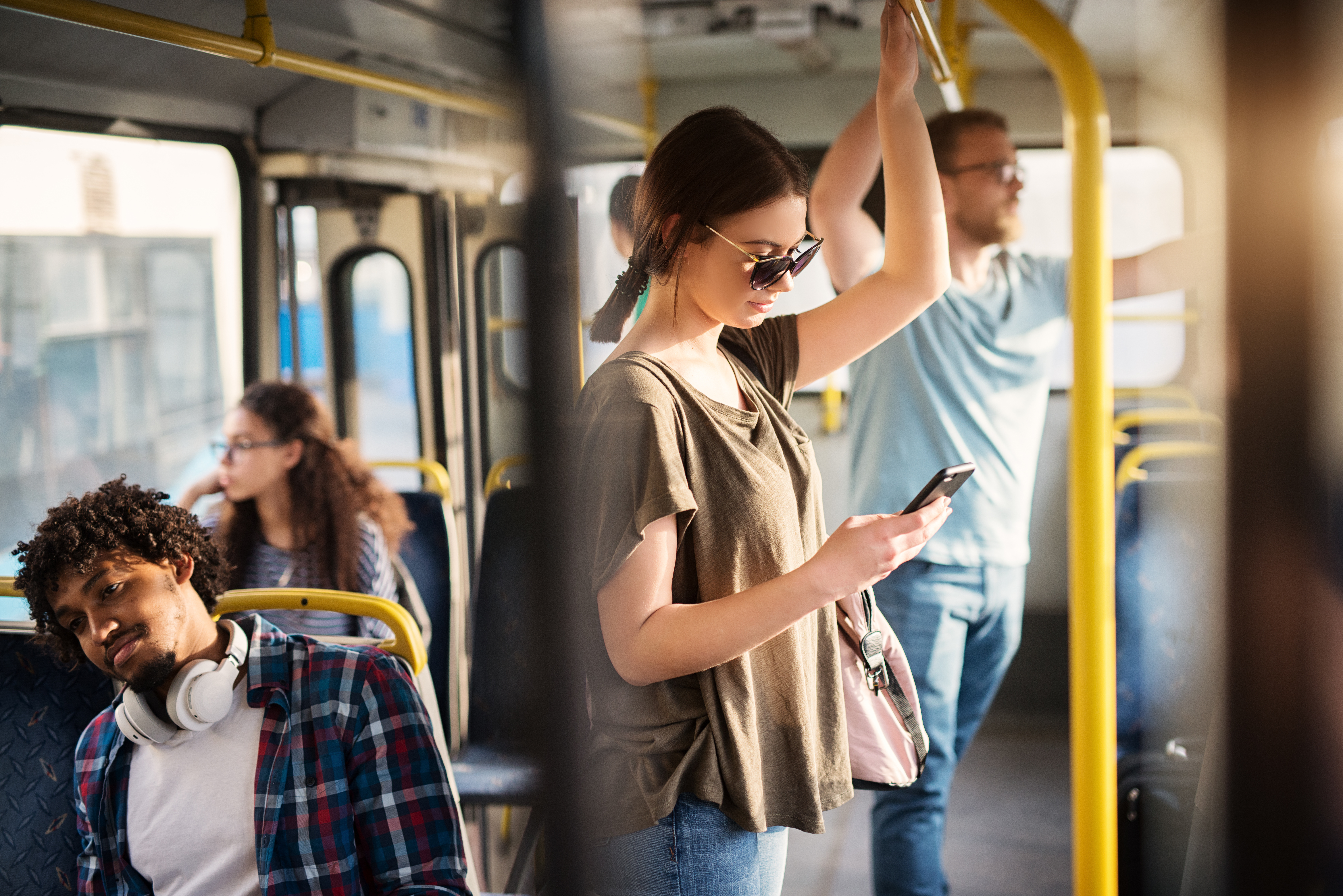people riding a bus