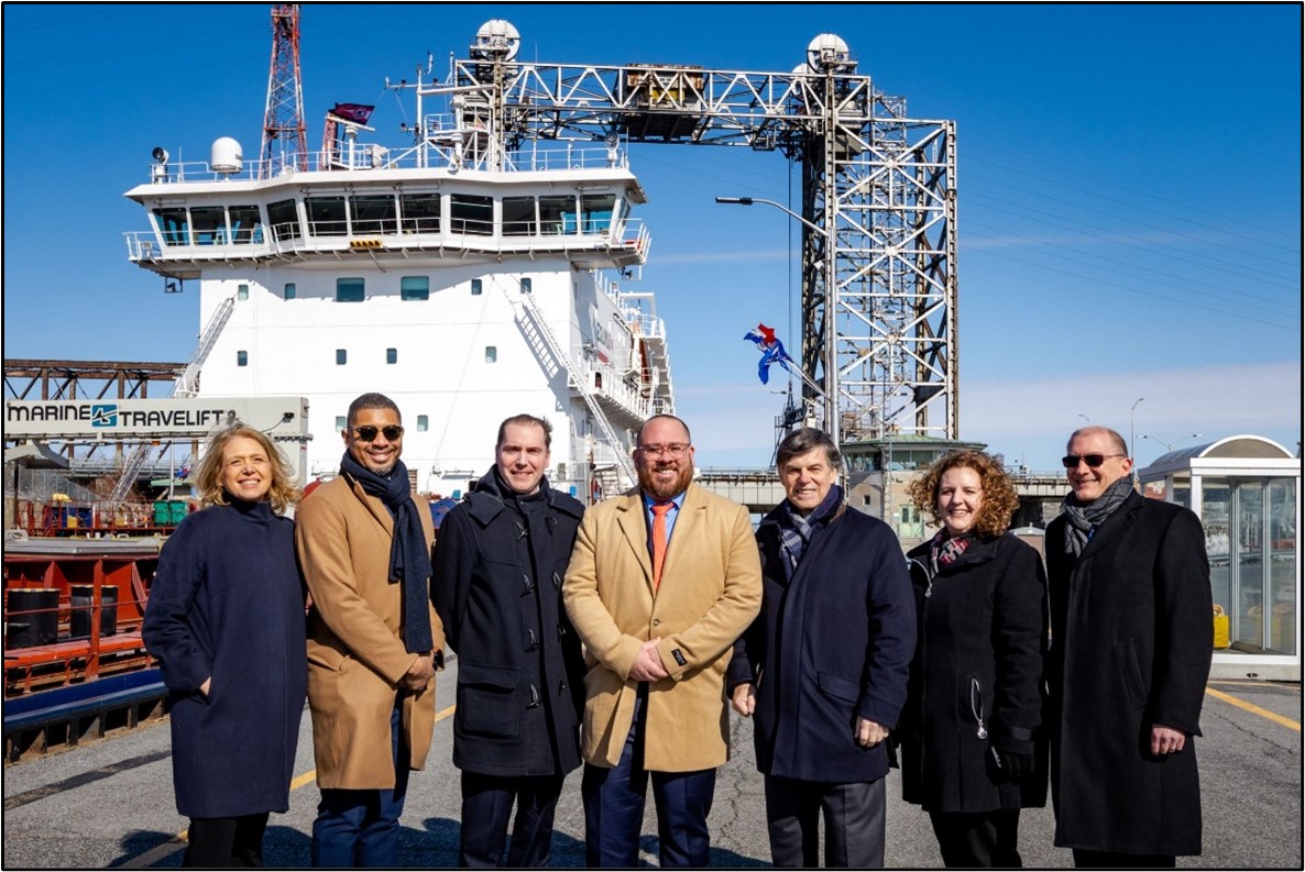 (L-R): Maja Vodanovic, Mayor of the Borough of Lachine and member of the Executive Committee of the city of Montreal; Christopher Coes, Assistant Secretary Transportation Policy, U.S. Department of Transportation; Dominic Rochon, Associate Deputy Minister, Transport Canada; Adam Tindall-Schlicht, Administrator, U.S. Great Lakes St. Lawrence Seaway Development Corporation; Terence Bowles, President and CEO, St. Lawrence Seaway Management Corporation; Danielle Lewis, Manager of Raw Materials, ArcelorMittal Dofasco; Gregg Ruhl, President & CEO, Algoma Central Corporation at the opening of the St. Lawrence Seaway's 2023 navigation season. March 22, 2023. St. Lambert Lock in Montreal, Canada. Photo credit: The St. Lawrence Seaway Management Corporation