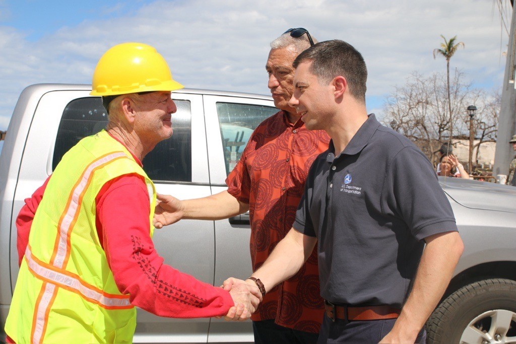 Secretary Buttigieg greets a worker