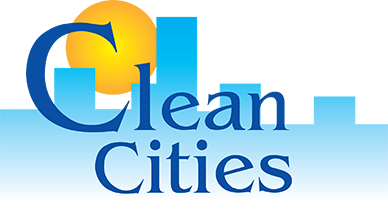a logo with the text “Clean Cities” in front of a digital depiction of a filled-in skyline and sun