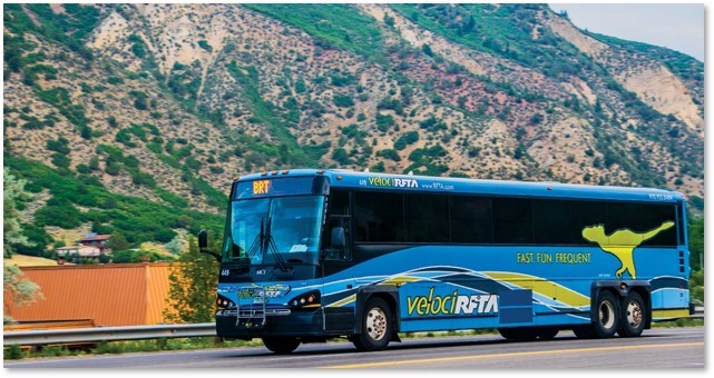 VelociRFTA Bus traveling down a mountain road