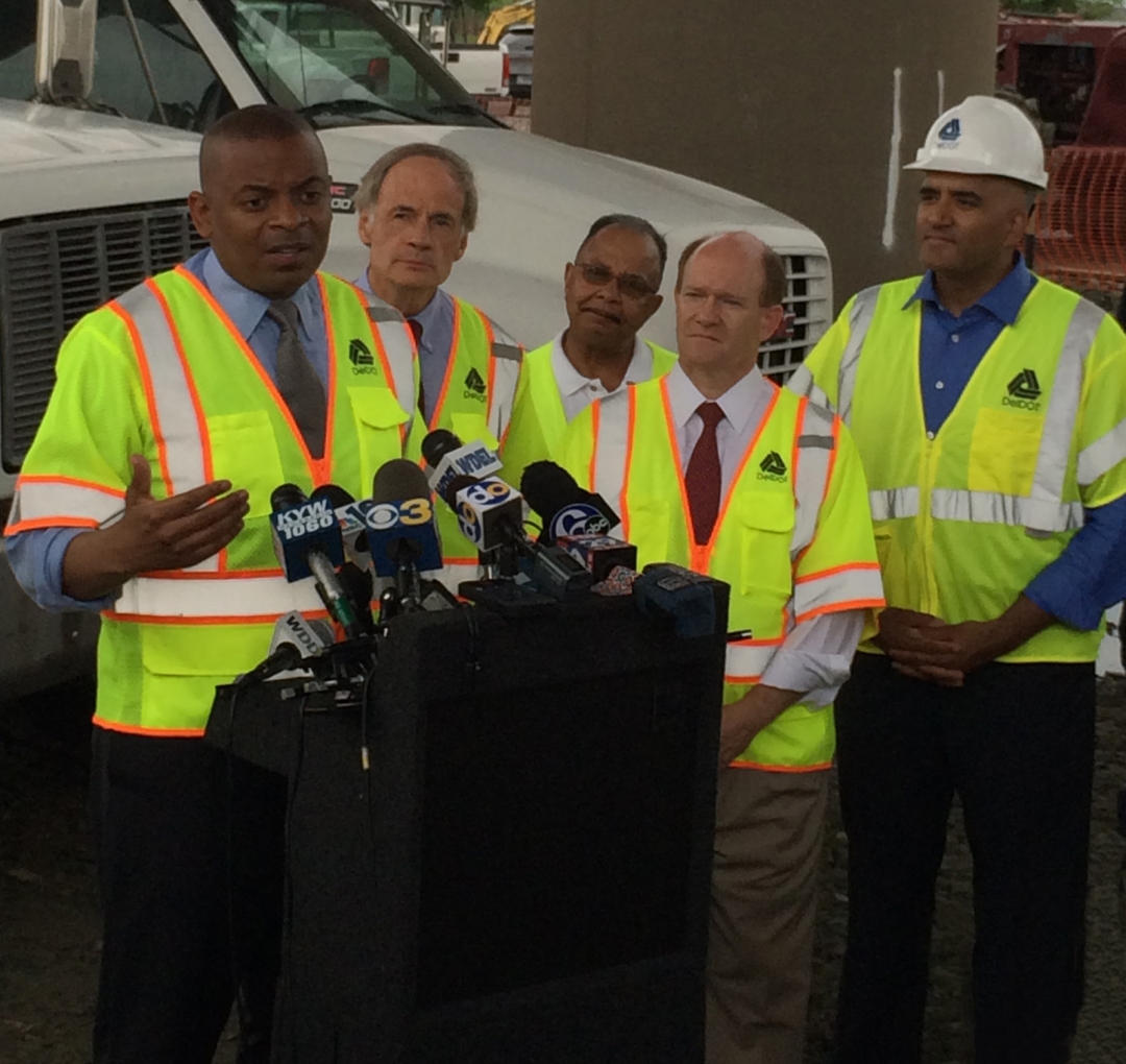 Photo of Secretary Fox and others at I-495 bridge near Wilmington, Delaware