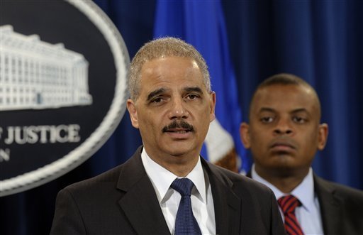 Photo of Secretary Foxx and Attorney General Holder, credit Susan Walsh, AP Photo of Secretary Foxx and Attorney General Holder, credit Susan Walsh, AP