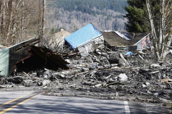 Photo of debris blocking state Route 530, credit Lindsey Wasson / Reuters