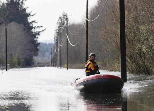 Photo of flooding on Route 530, credit Jason Redmond / Reuters