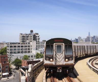 A metro train during the day.
