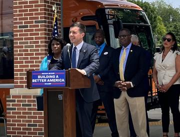 secretary speaking at podium