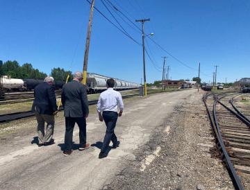 secretary walk near railway