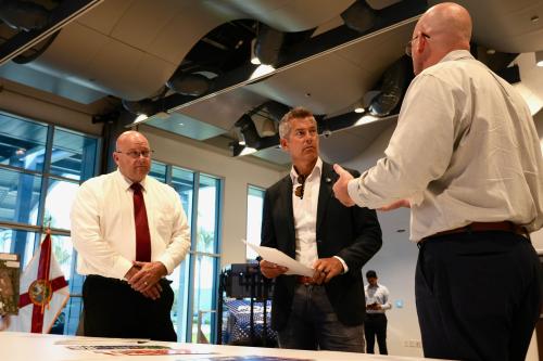 Secretary Duffy speaks with FDOT officials following the tour 