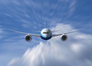 Plane flying through blue sky