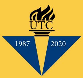 UTC Logo: torch with years 1987-2020